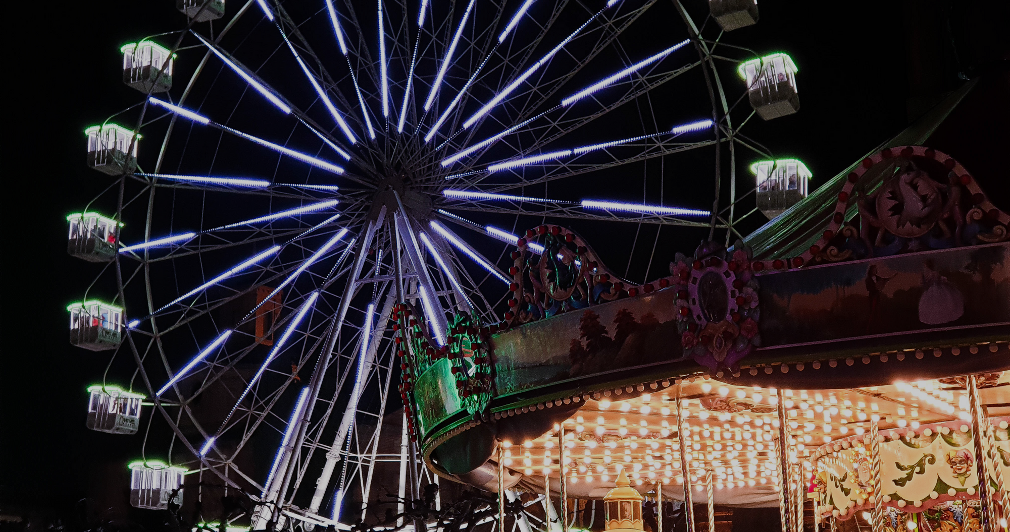 western equestrian apparel to wear to the county fair, brightly colored ferris wheel against the night sky. 