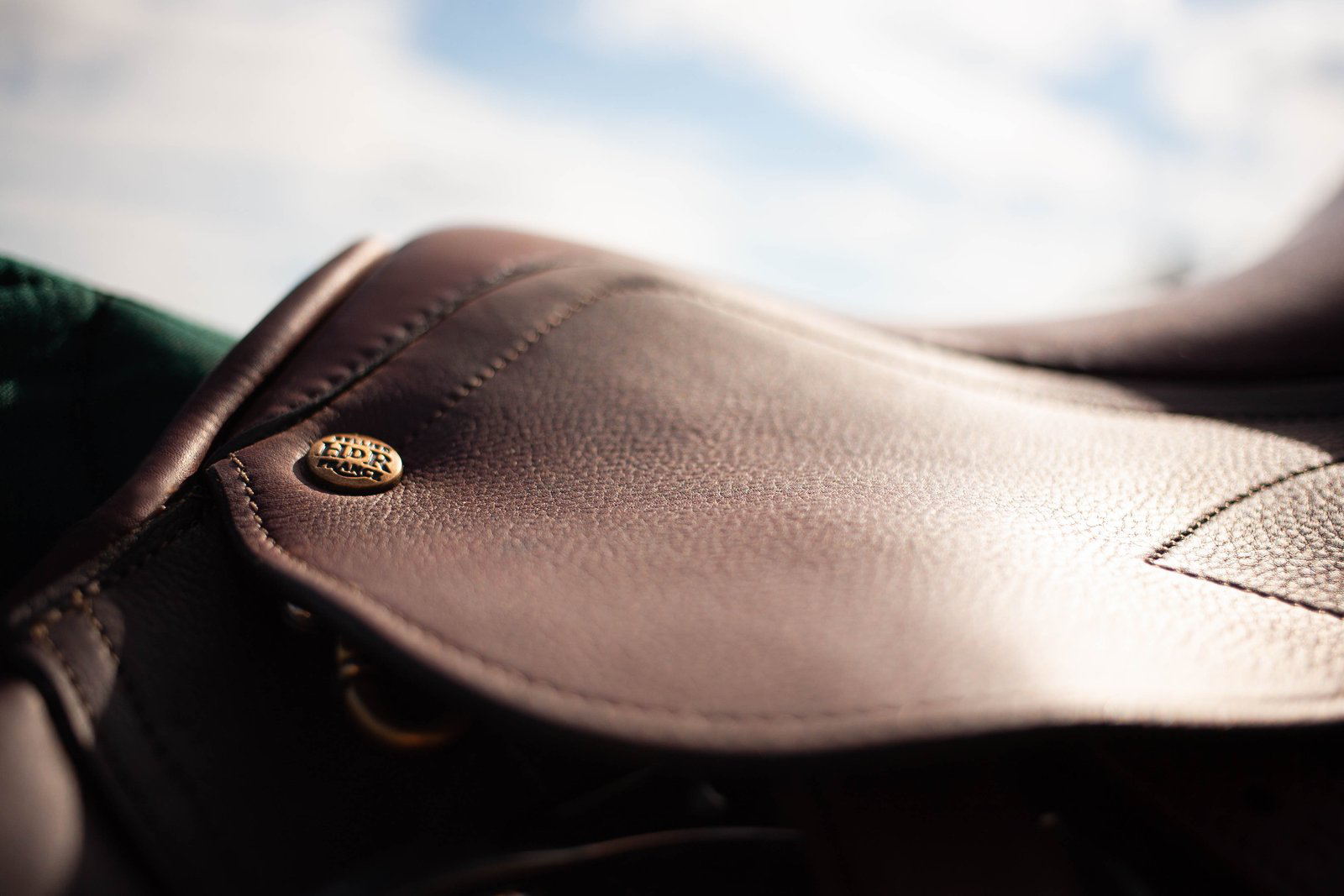 saddle fit for brown saddle, black saddle pad, bay horse